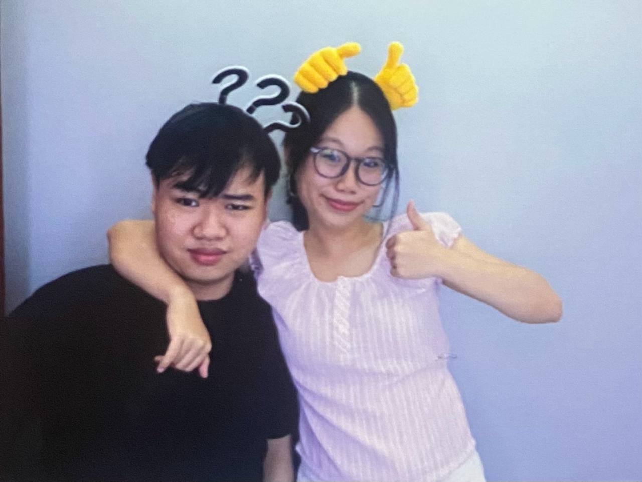 us posing together with playful decorations